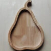 Wooden snack tray set with squirrel, apple, acorn, and pear designs in a neutral color palette.